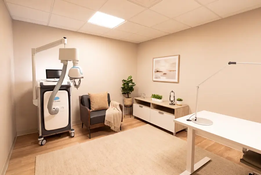 The TMS treatment chair and device at Bishop Health