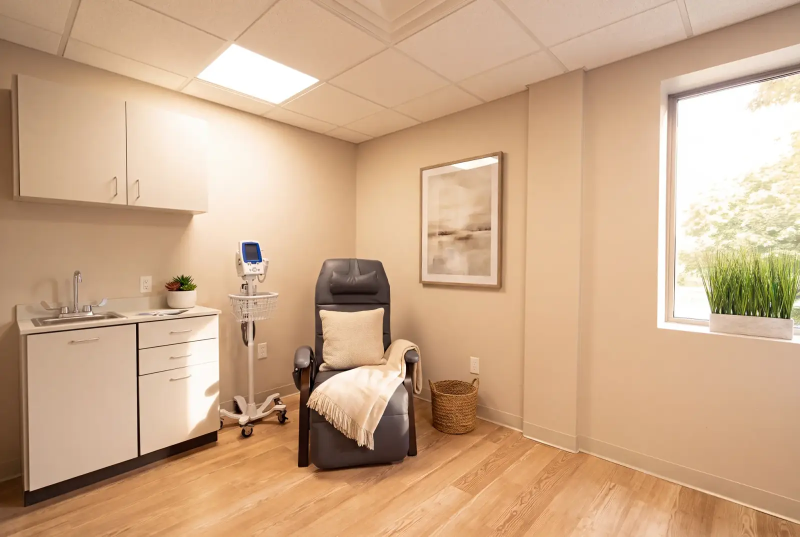A private ketamine infusion room with recliner and vitals monitoring at Bishop Health